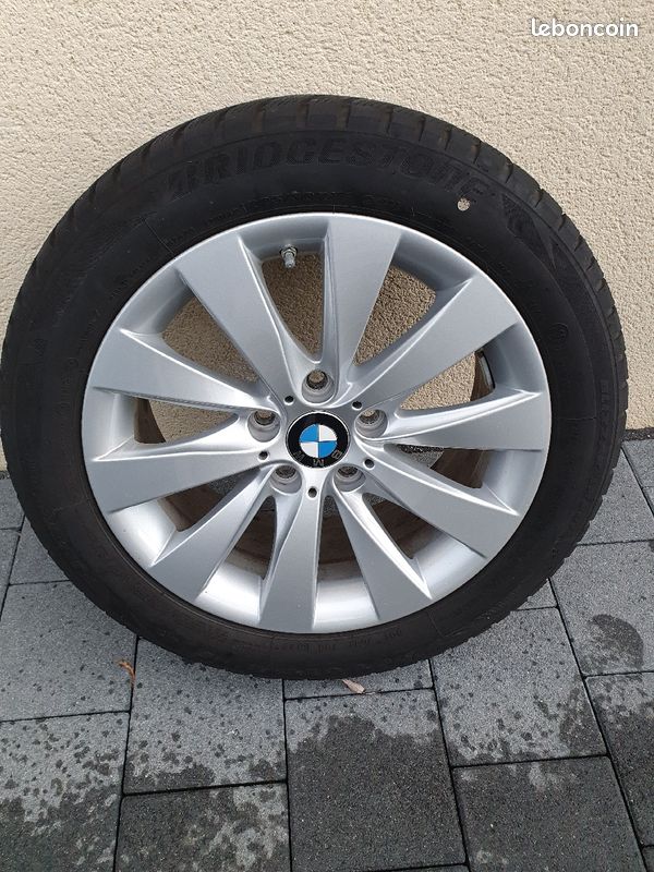 Jantes BMW 17" d'origine avec pneu neige runflat Brigestones - 1